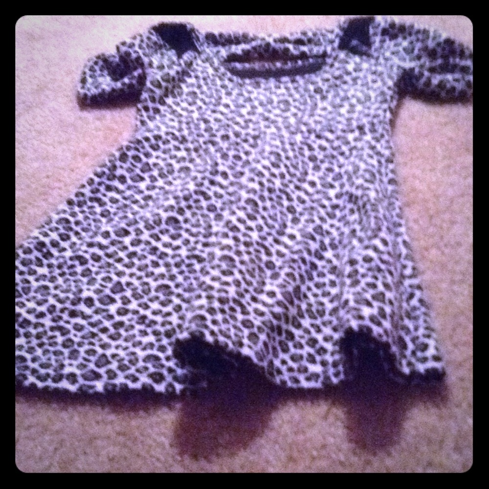 A cheetah dress and a glittery purse